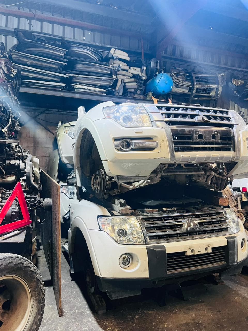 Mitsubishi Pajero front clips stacked at the shop in Sharjah