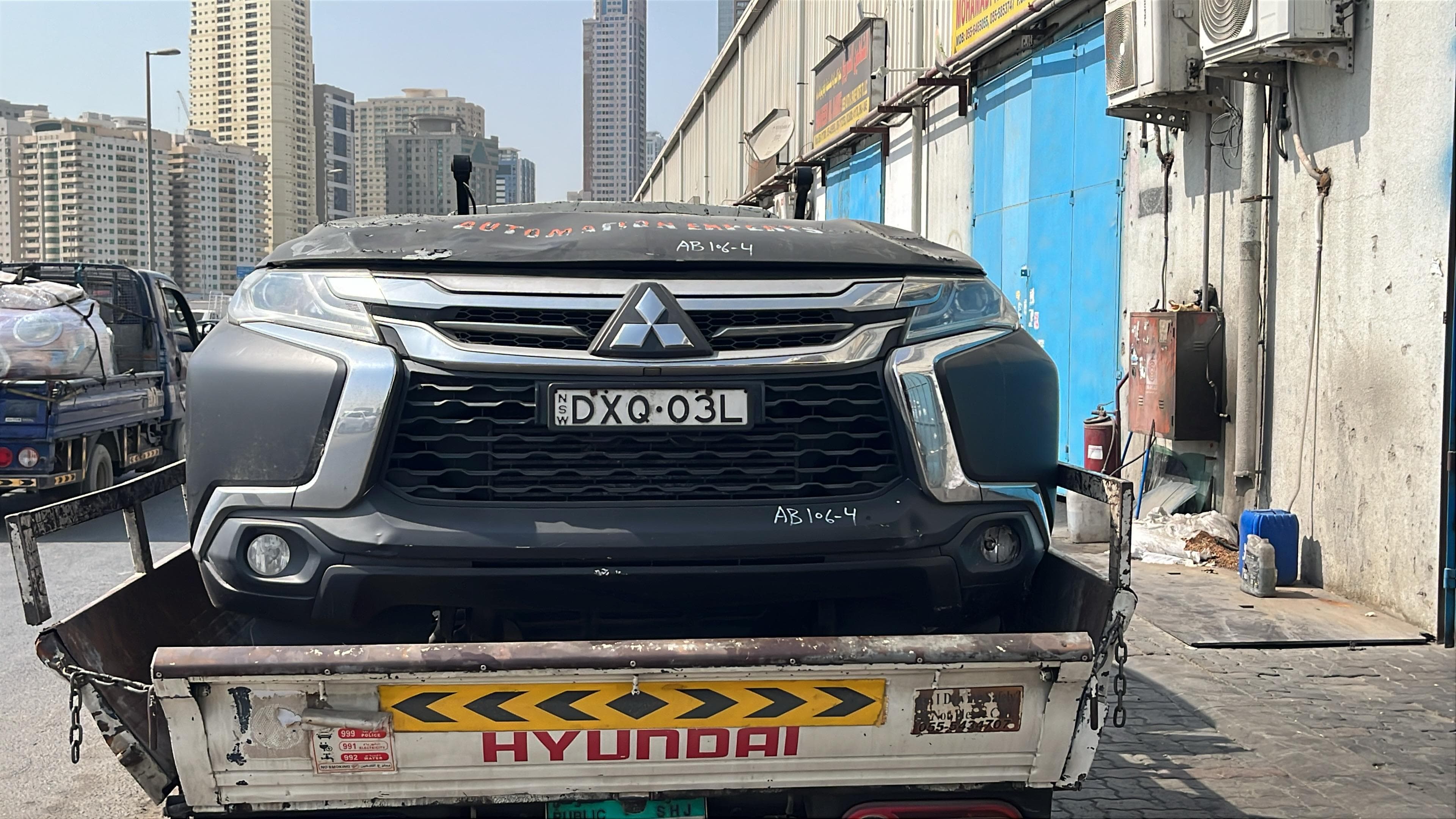 Used Mitsubishi Pajero Sport front end on a truck
